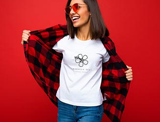 Happy person showing off a t-shirt with a custom logo